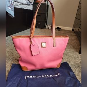Dooney and bourke. New with tags and papers.